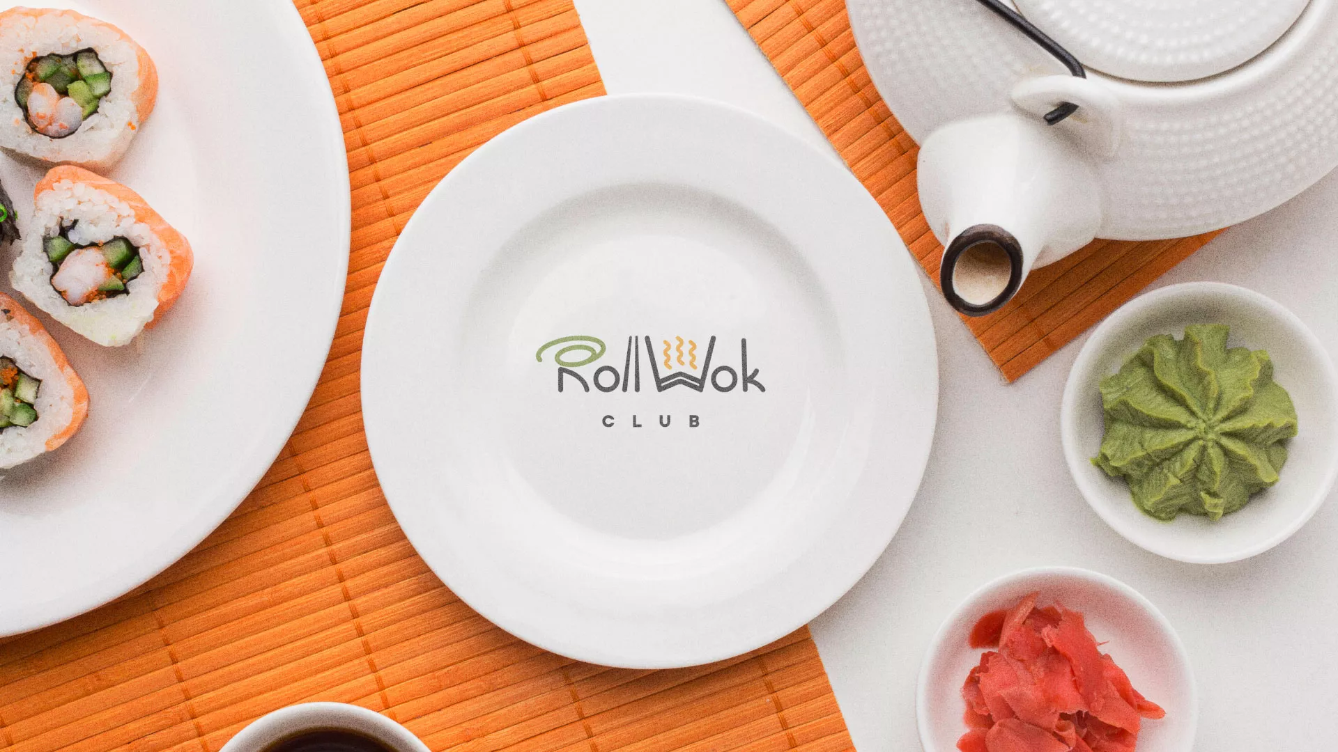 Разработка логотипа и фирменного стиля в Алатыре для суши-бара «Roll Wok Club» Разработка логотипа и фирменного стиля в Алатыре для суши-бара «Roll Wok Club»